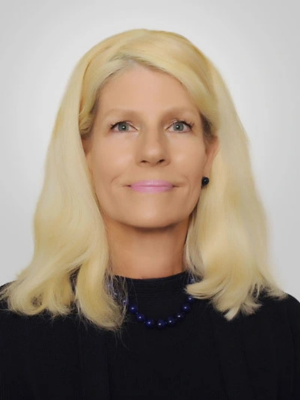 White woman with blonde hair and black shirt headshot